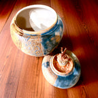 A Jar, with a baby dragon
