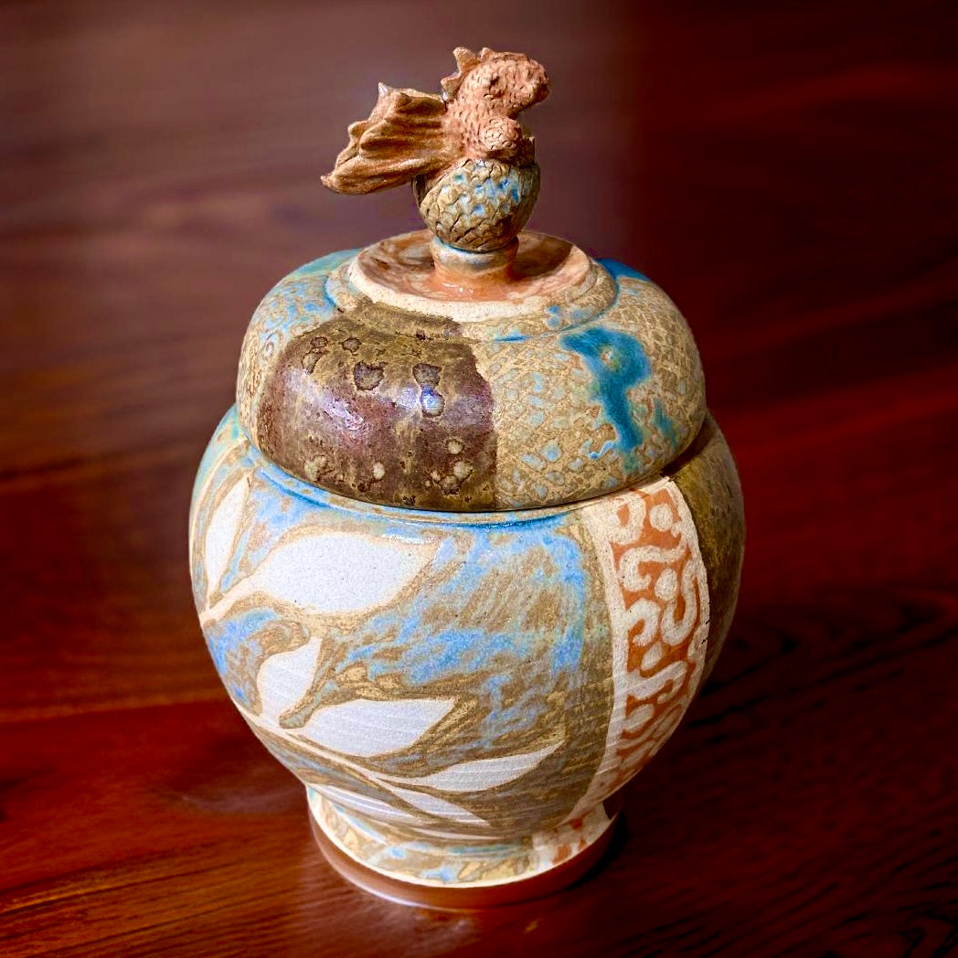 A Jar, with a baby dragon