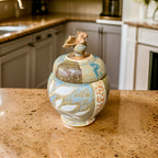 A Jar, with a baby dragon