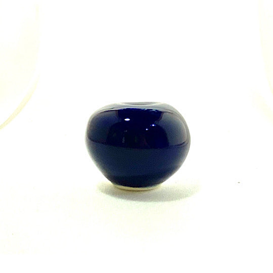 A small single flower vase