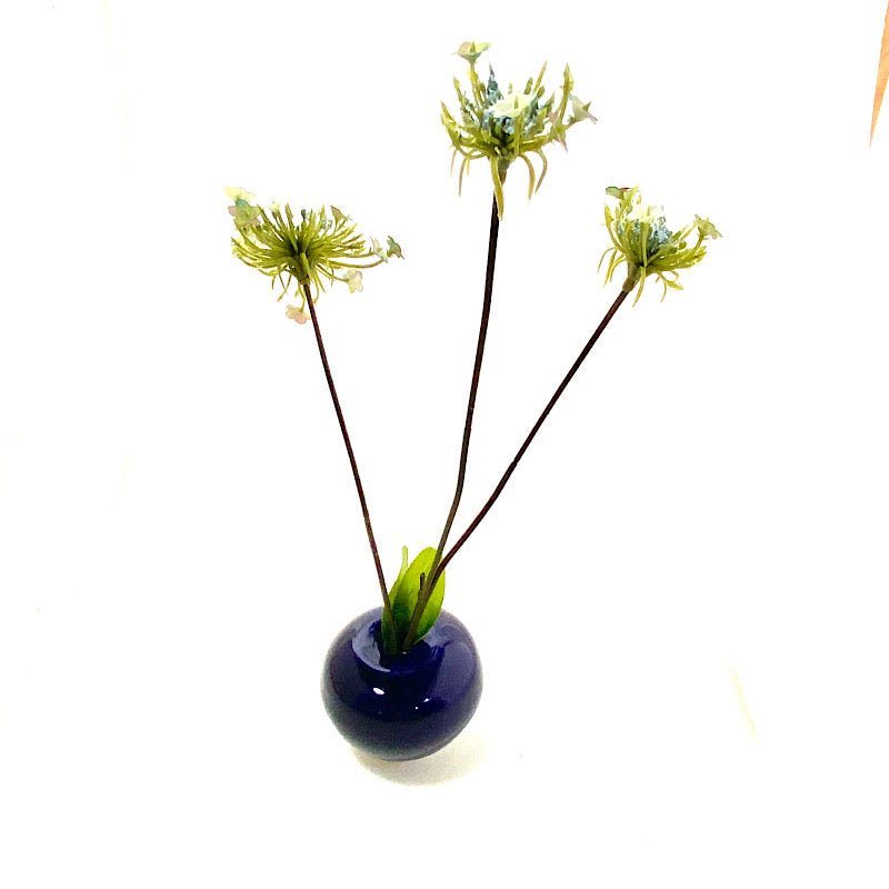 A small single flower vase