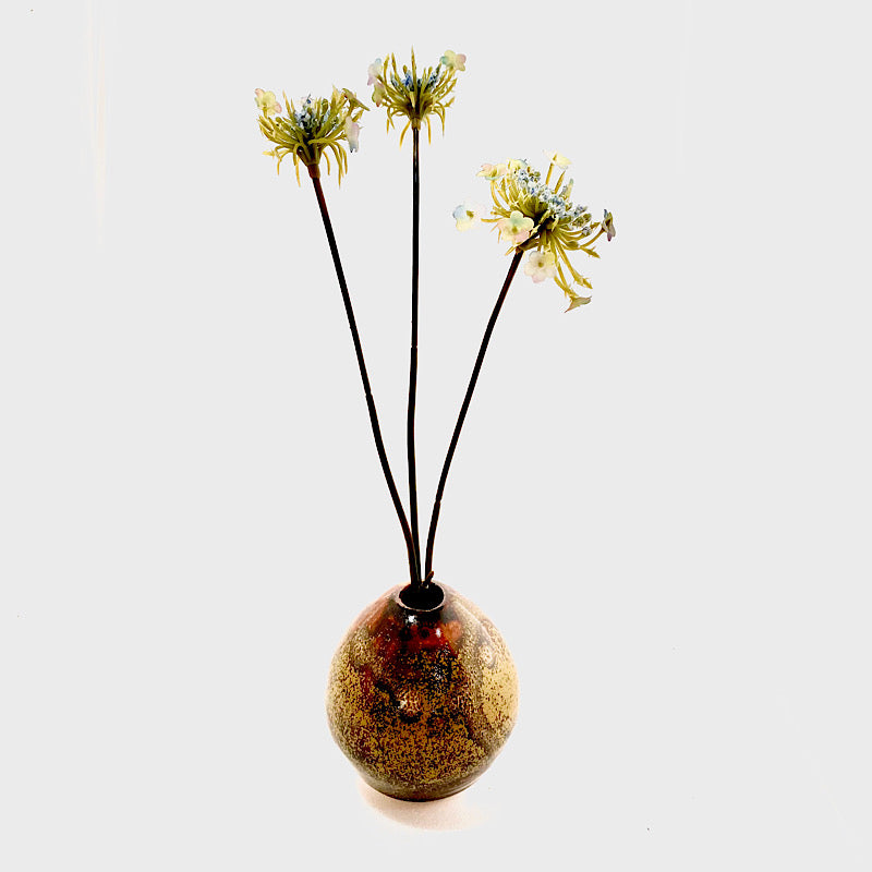 A small single flower vase